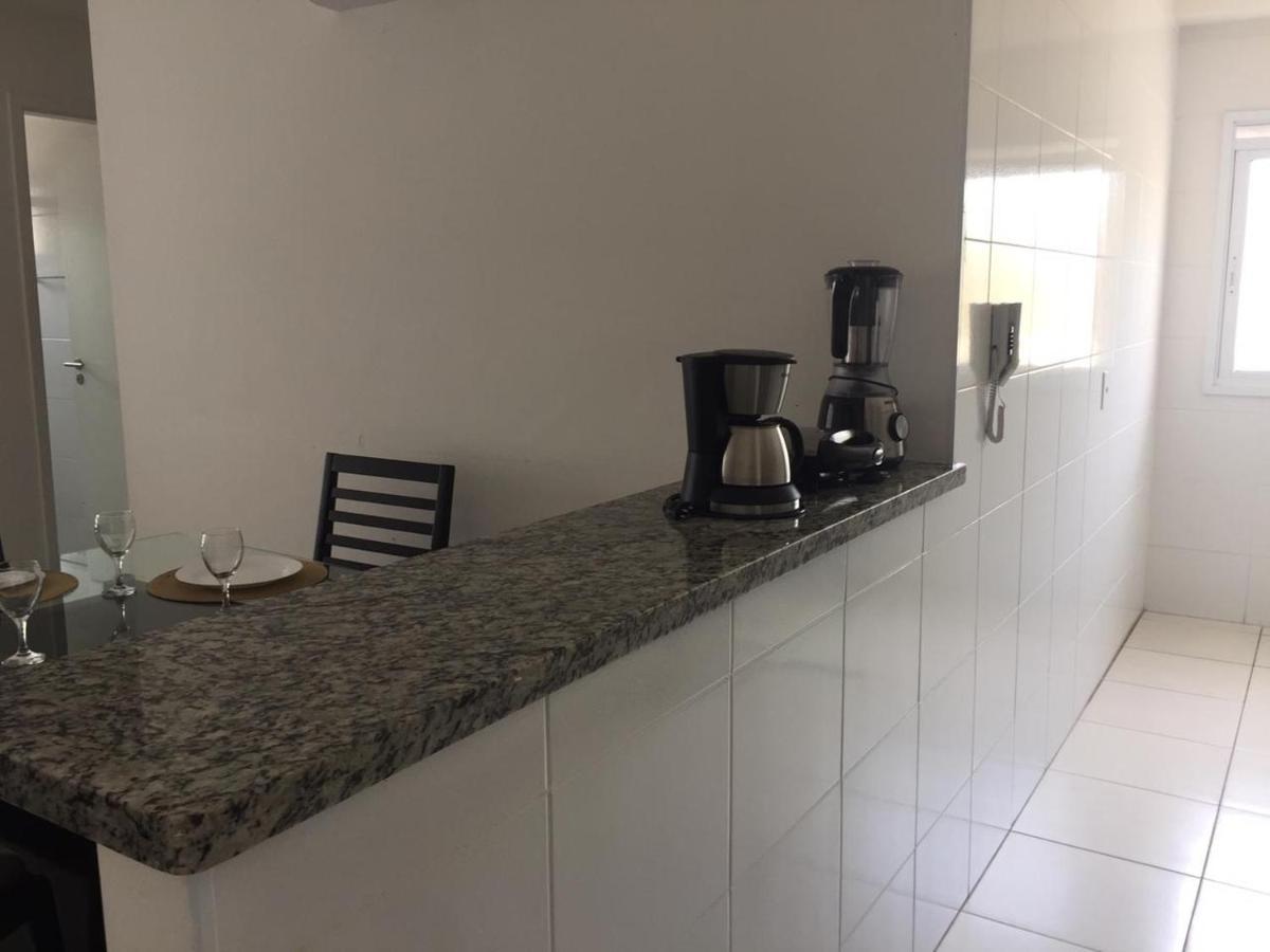 Apartamento Villa Di Fiori Enseada กัวรูจา ภายนอก รูปภาพ